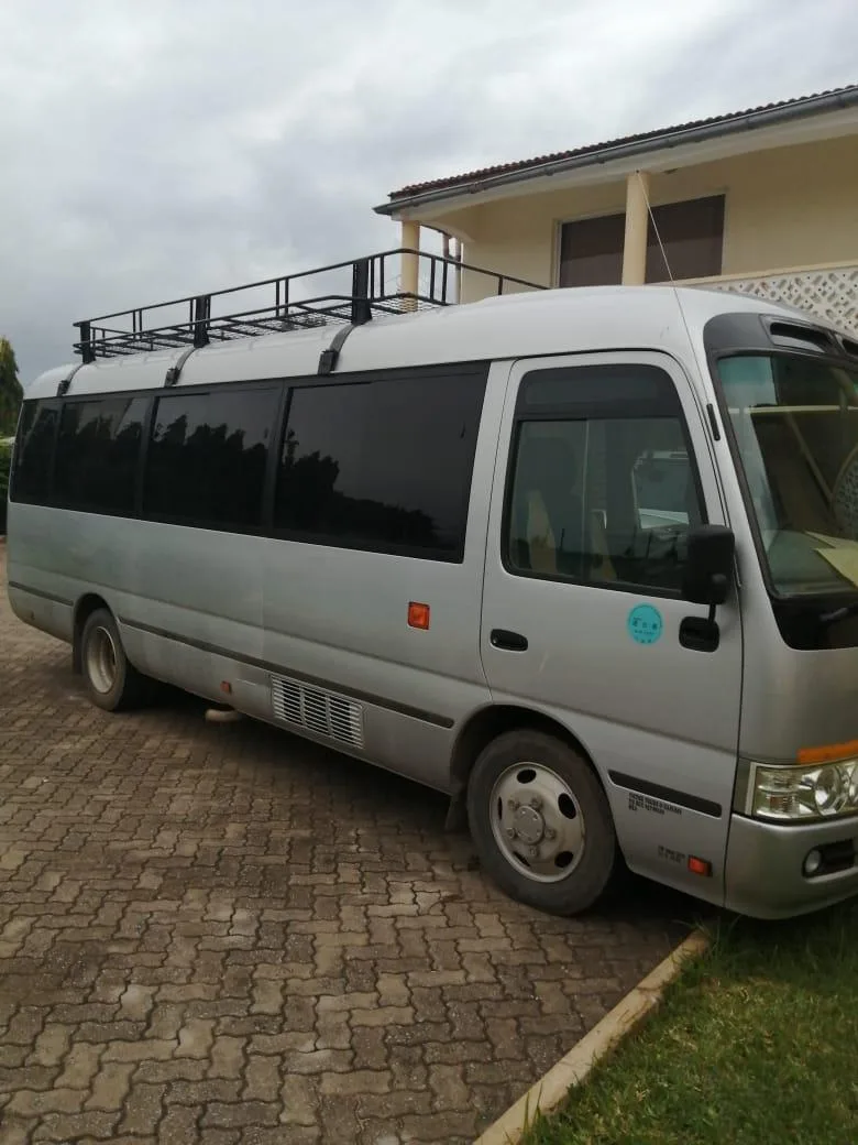 Toyota Coaster Bus | Courtesywide Adventures